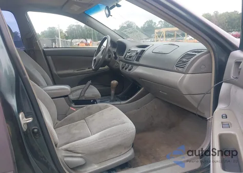 2002 Toyota Camry Le z USA, uszkodzony, nr VIN 4T1BE32K22U599422